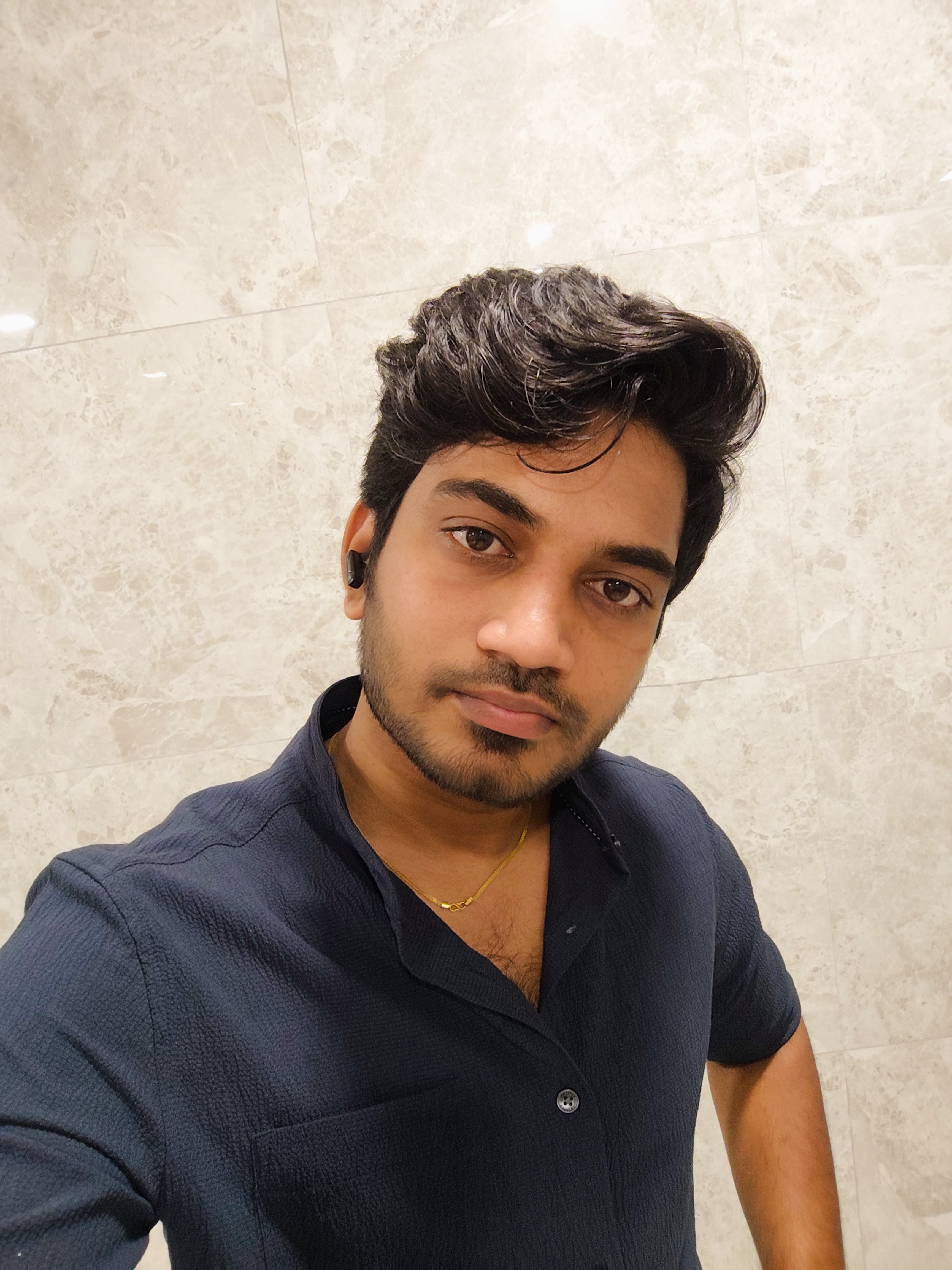 Siva R. — Left profile
