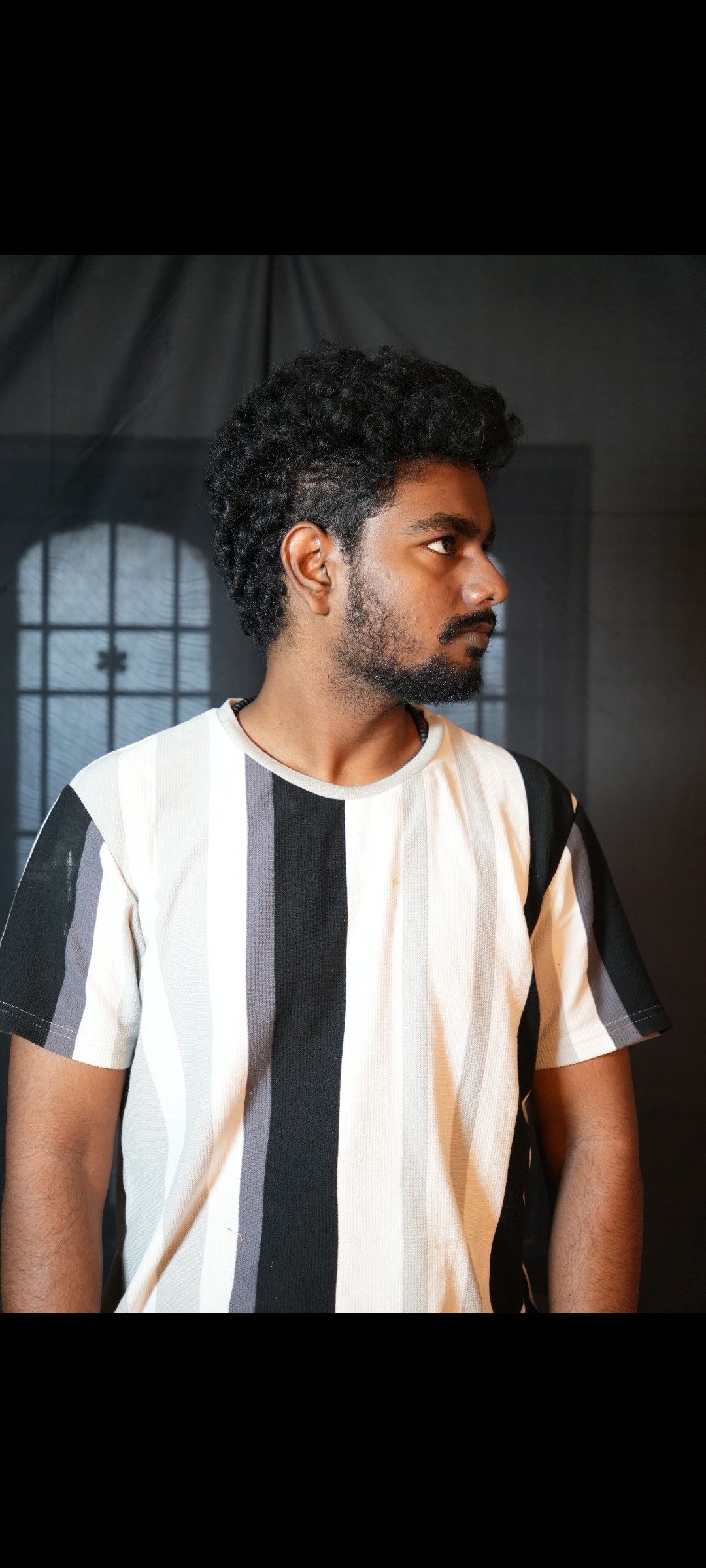 PRADEEP M. — Left profile