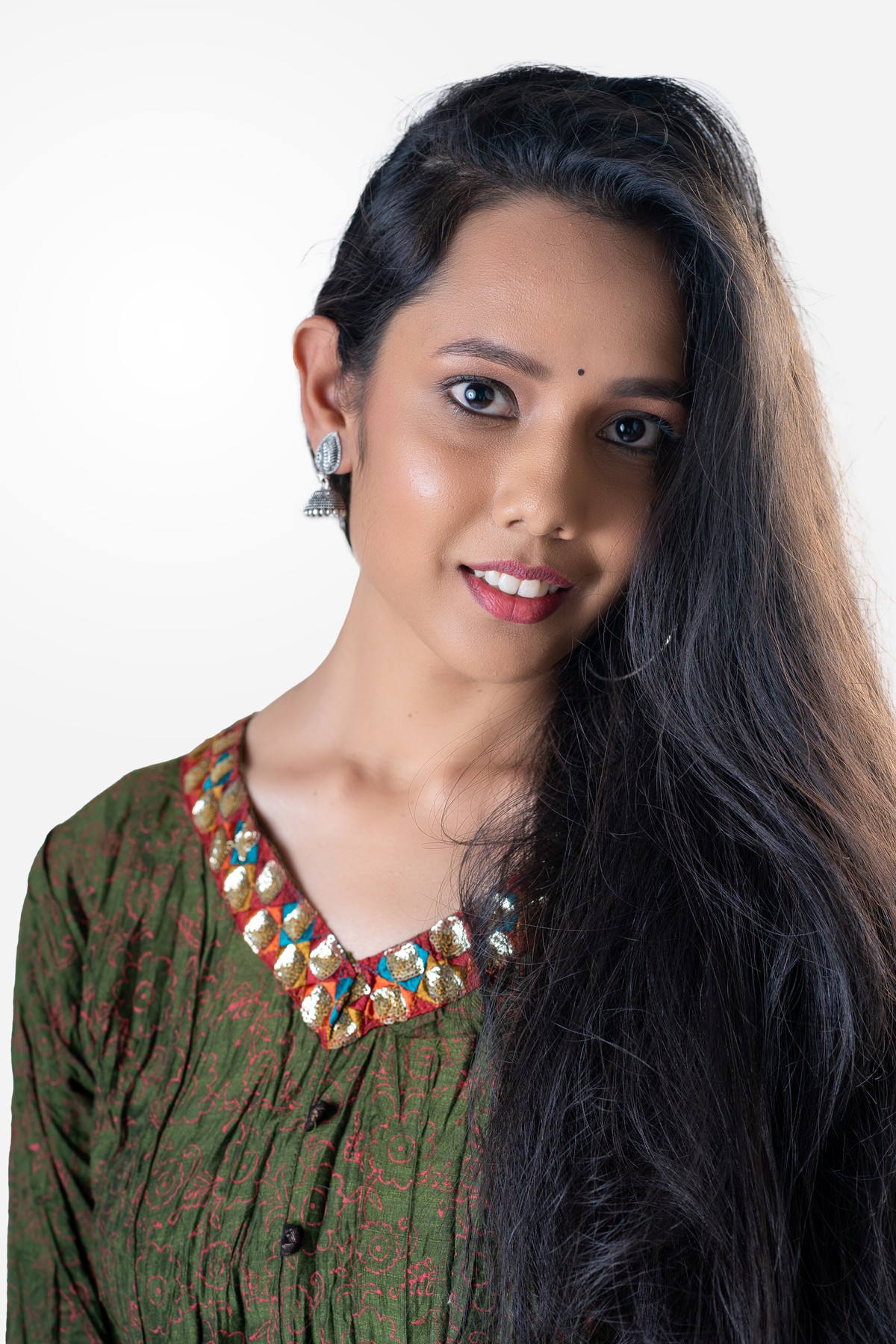 Rohini J. — Left profile